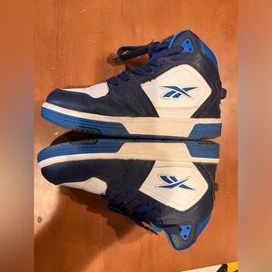 Blue and white Reebok sneakers